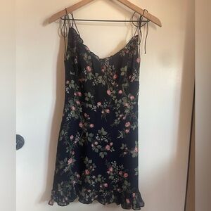 Reformation short Black Dress with pink floral, green leaf, and lady bugs